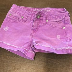 Cute light purple Justice cute off jean shorts. Size 7 slim. New condition.